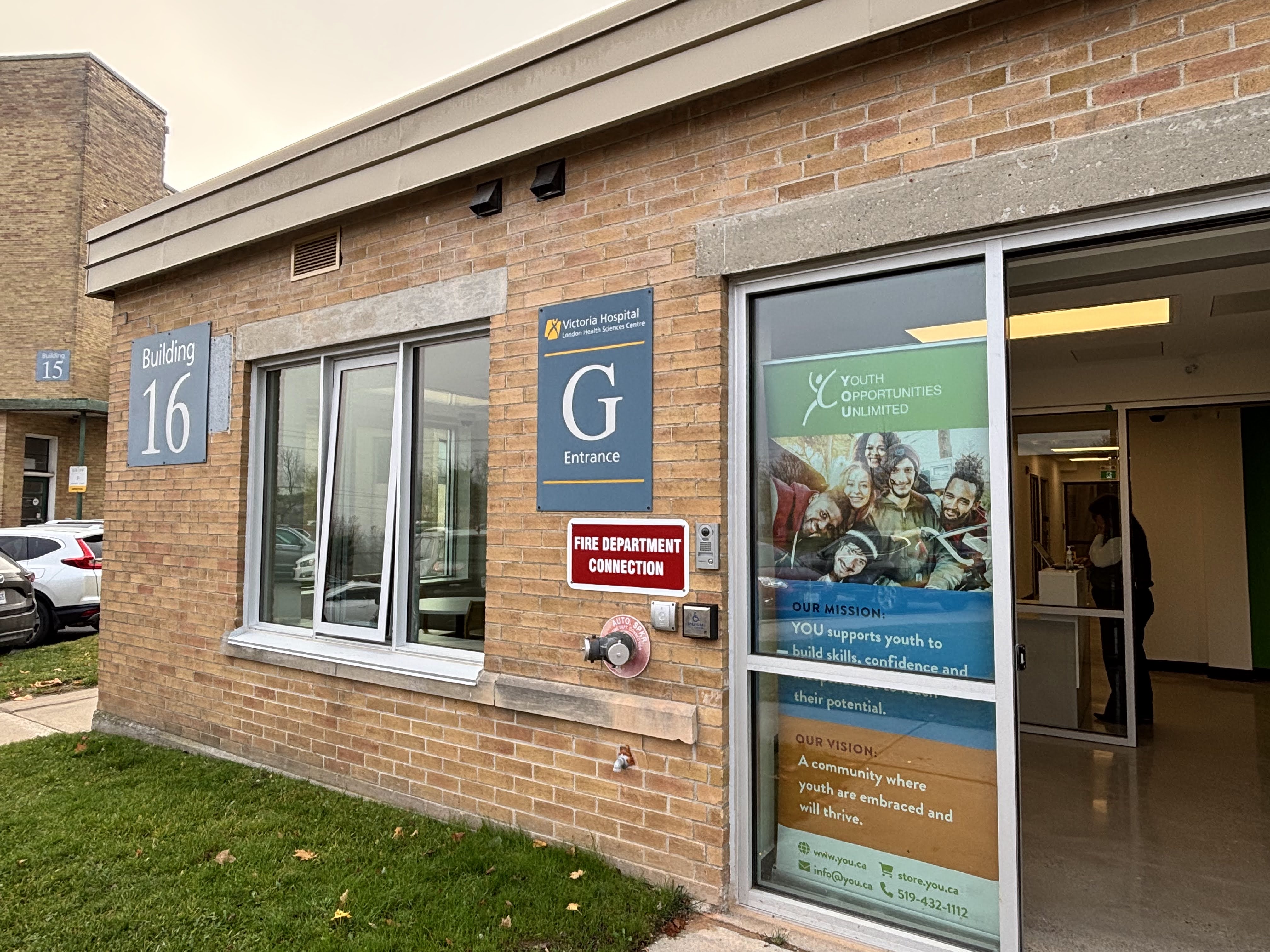 Front entrance to Community Youth Hub at London Health Sciences Centre. Sign on exterior of building reads "Building 16". 